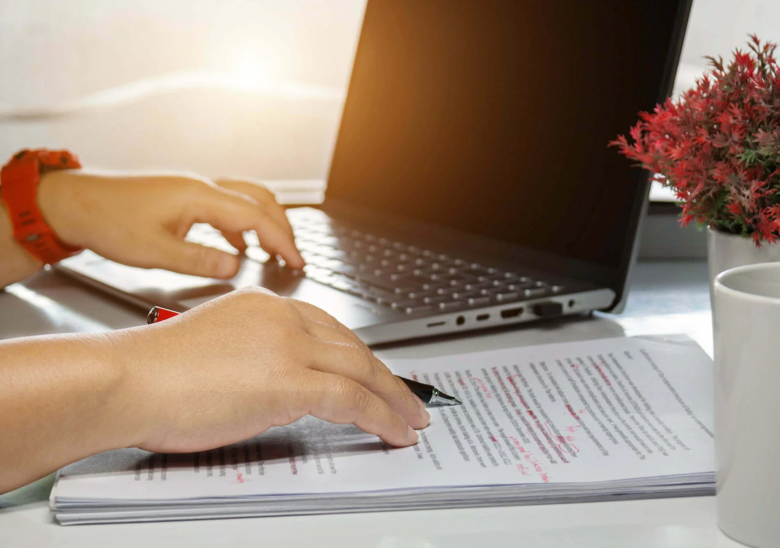 Editor reviewing and refining a manuscript